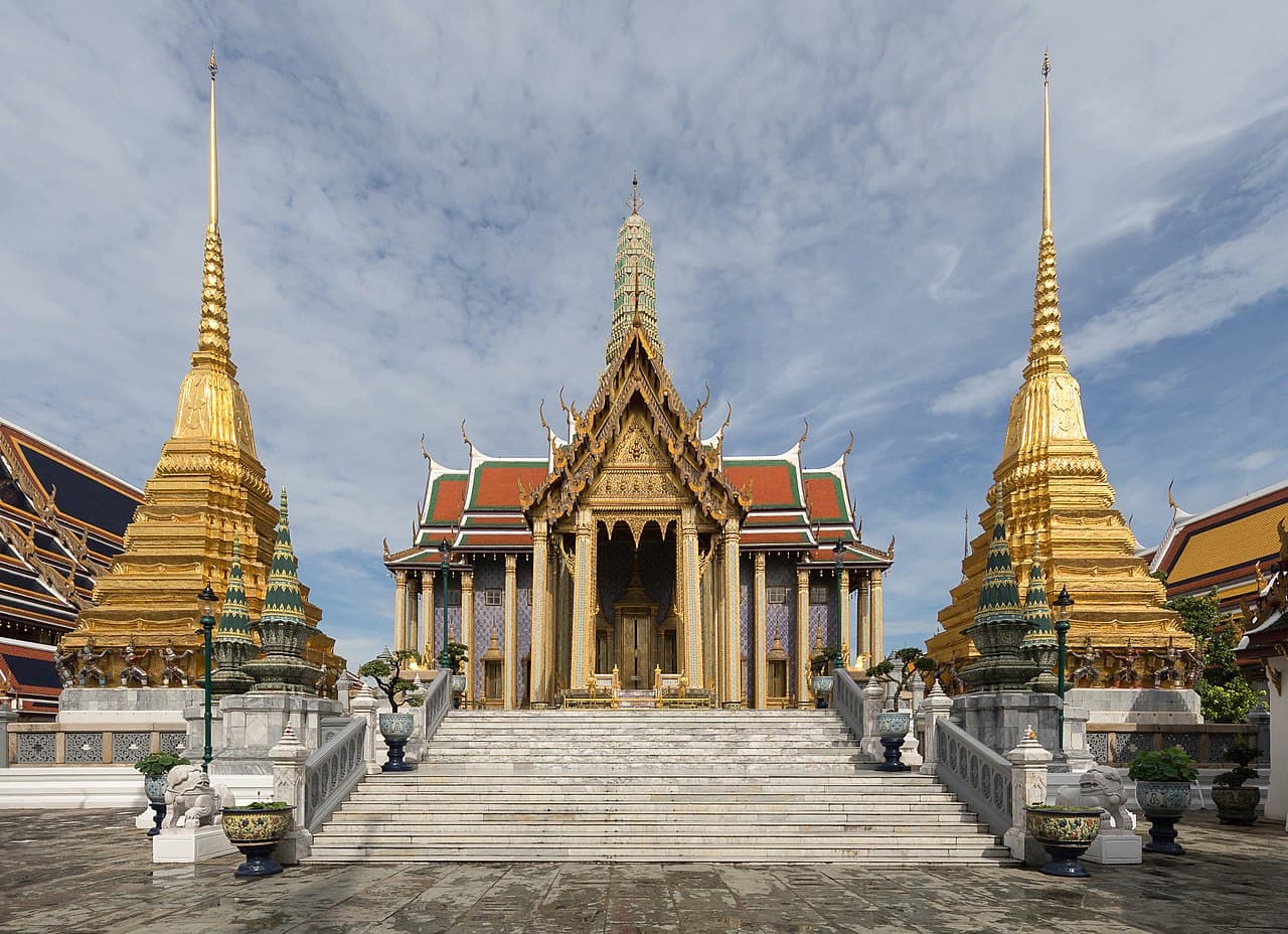 Golden spires and ornate rooftops of Wat Phra Kaew inside the Grand Palace, Bangkok
