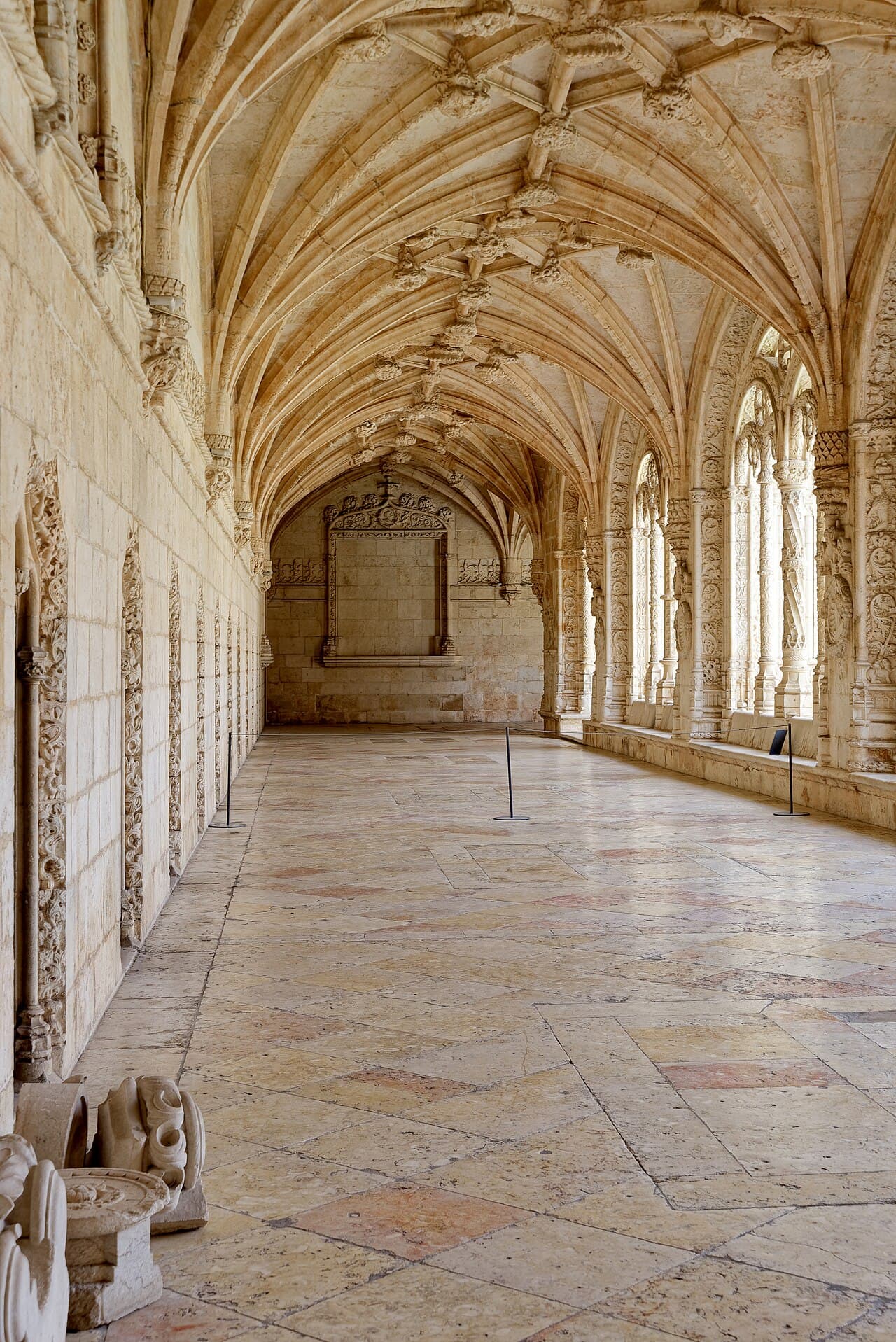 The intricately carved stone cloisters of Jerónimos Monastery in Belém, Lisbon
